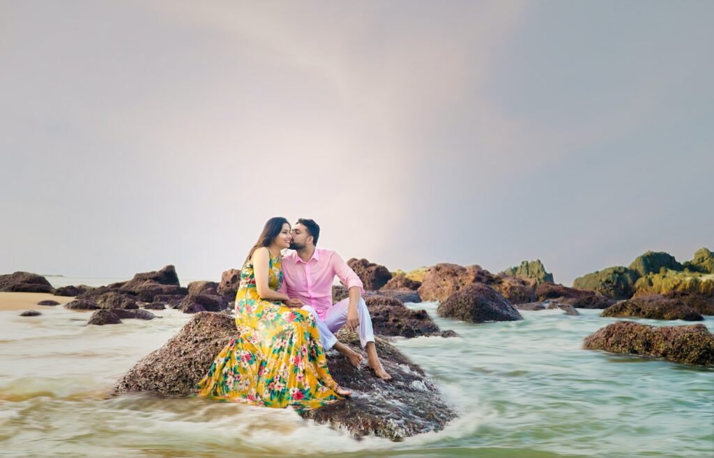 Photo of a Couple Sitting on Rock-Relationship Is Ready for Marriage
