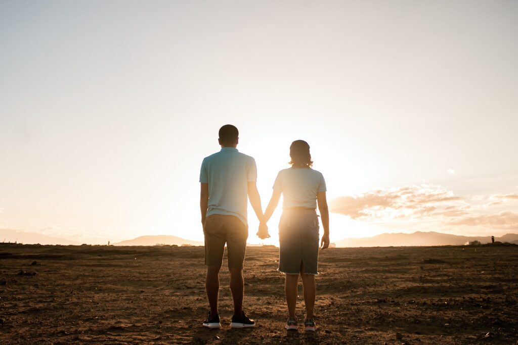 Couple Standing on Field During Golden Hour-Love and Appreciation
