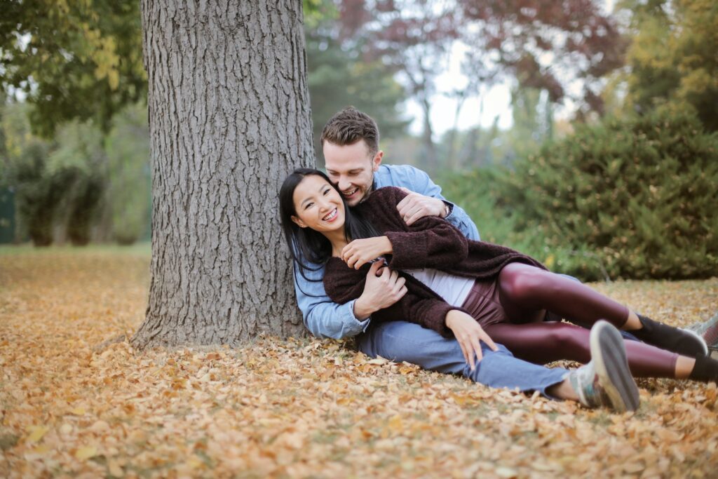 Couple Reclining Under The Tree-Romance Alive in a Busy Family Life