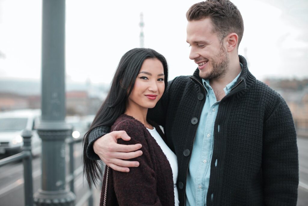 Selective Focus Photo of Smiling Couple Standing Next to Each Other-Seek Professional Help
