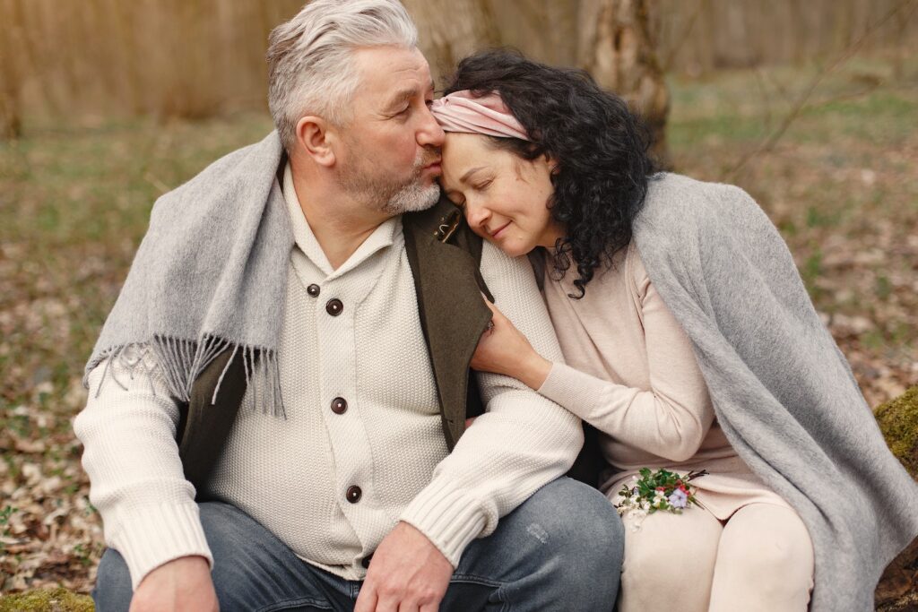 Happy senior couple hugging in autumn park-dating tips for shy people over 50