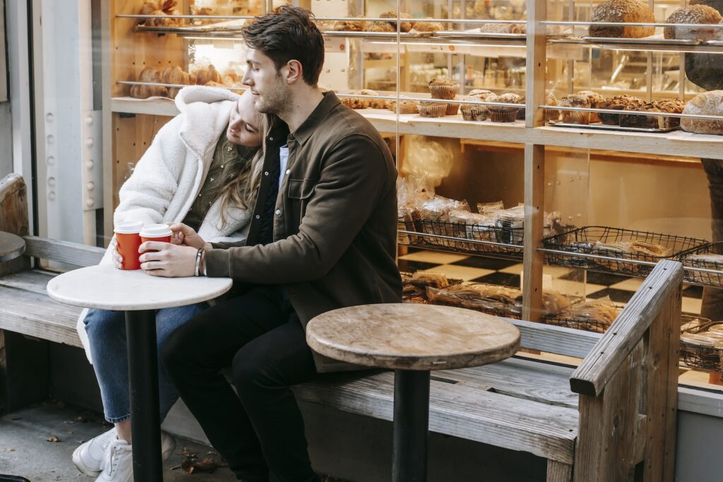 Young couple having rest in small cafeteria-Love Languages