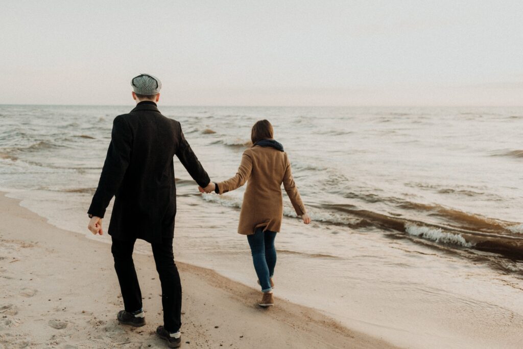 A Couple Walking on a Beach-Reconnect with Your Partner