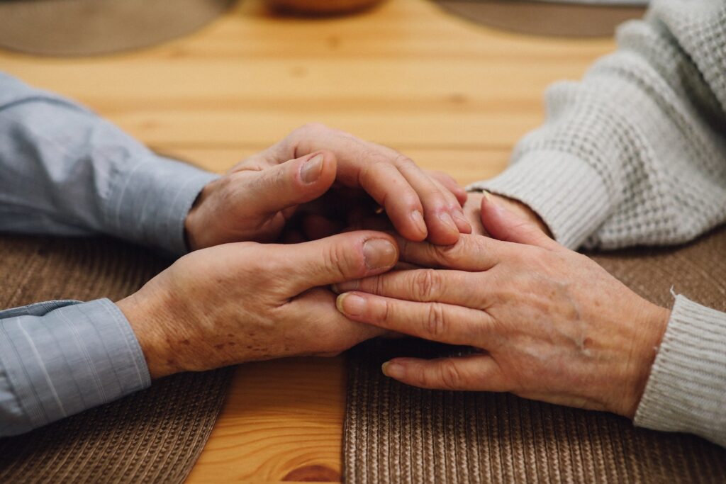 Close-up Photo of an Elderly Couple Holding Hands-dating tips for shy people over 50