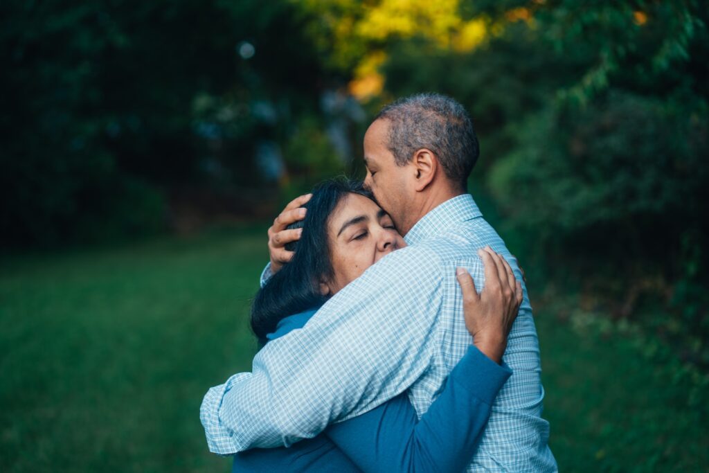 man hugging woman near trees-relationship last-love