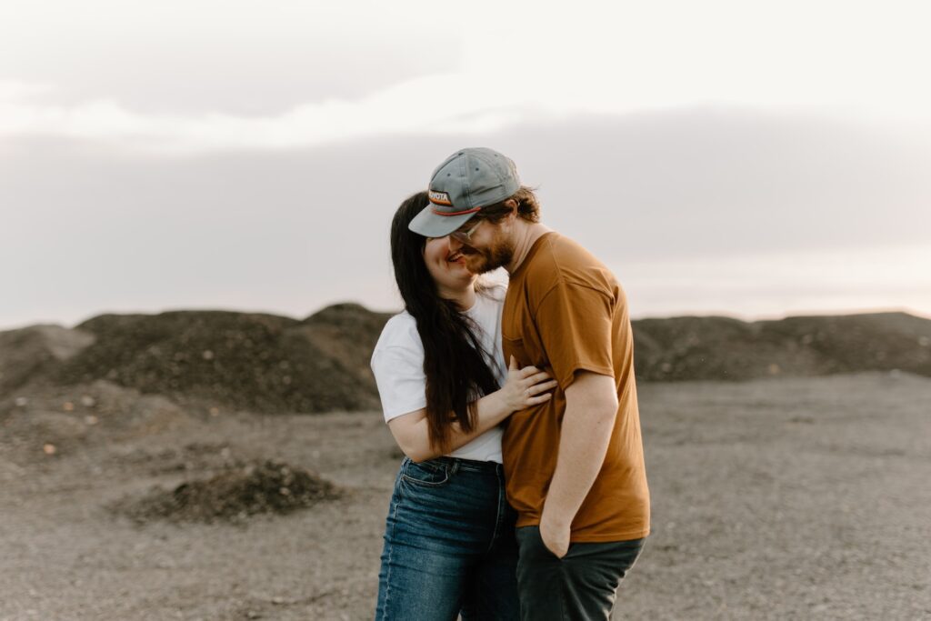 a man and a woman embracing in the desert- communication in a relationship