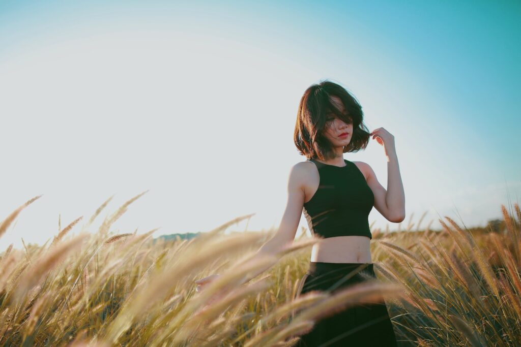 woman on wheat field during daytime-Forgive After Heartbreak