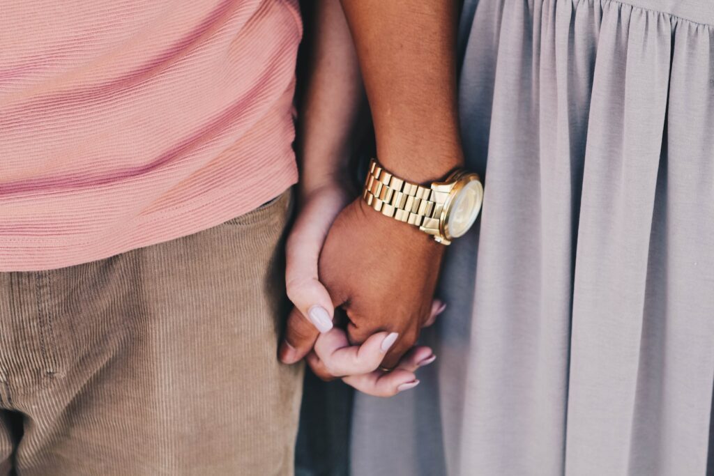 girl and boy holding hands white boy wearing gold-colored watch-You've Found Your Soulmate