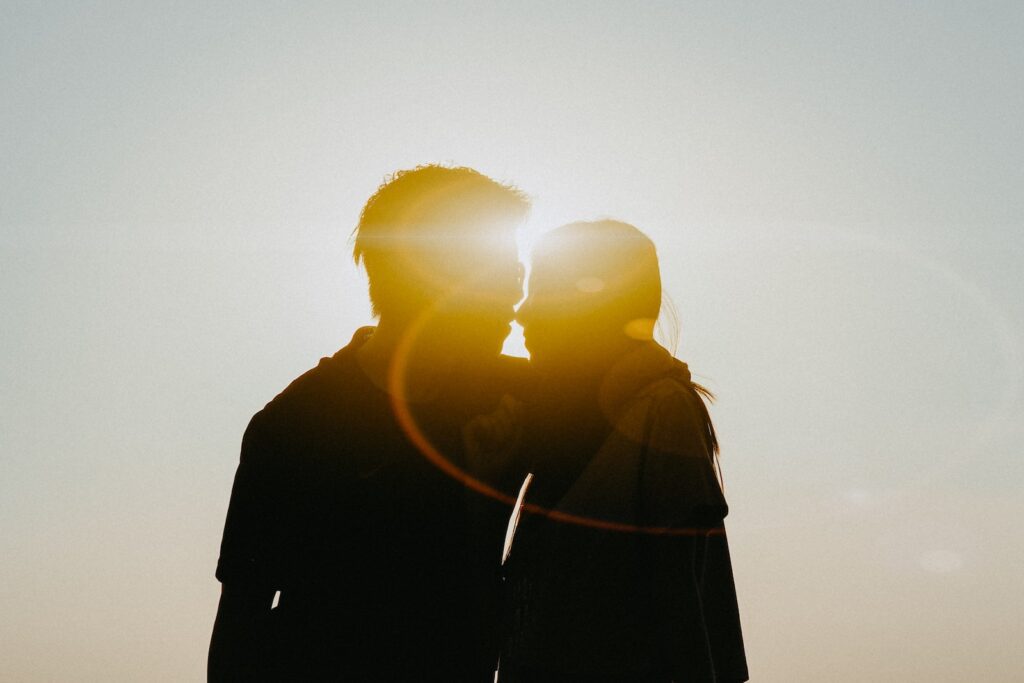 silhouette of man and woman about to kiss- Long-Distance Love