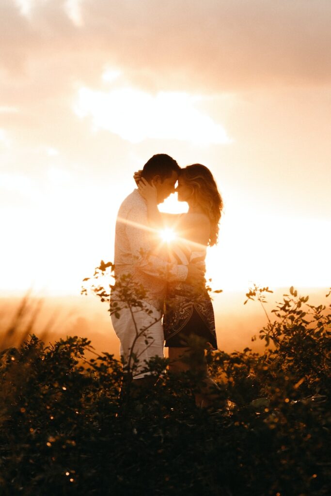 man and woman standing and touching foreheads during golden hour - Get Your Ex-Boyfriend Back