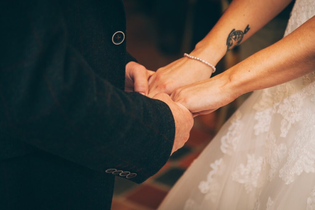 man and woman holding each others hand-lasting relationship