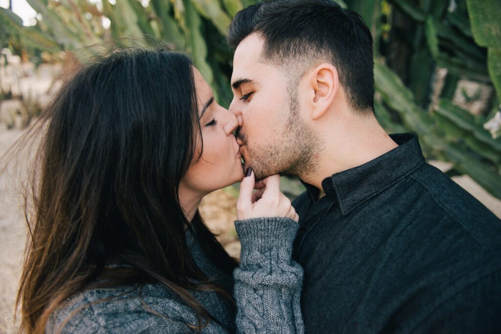 Photo Of Woman Kissing Man Hidden Passion