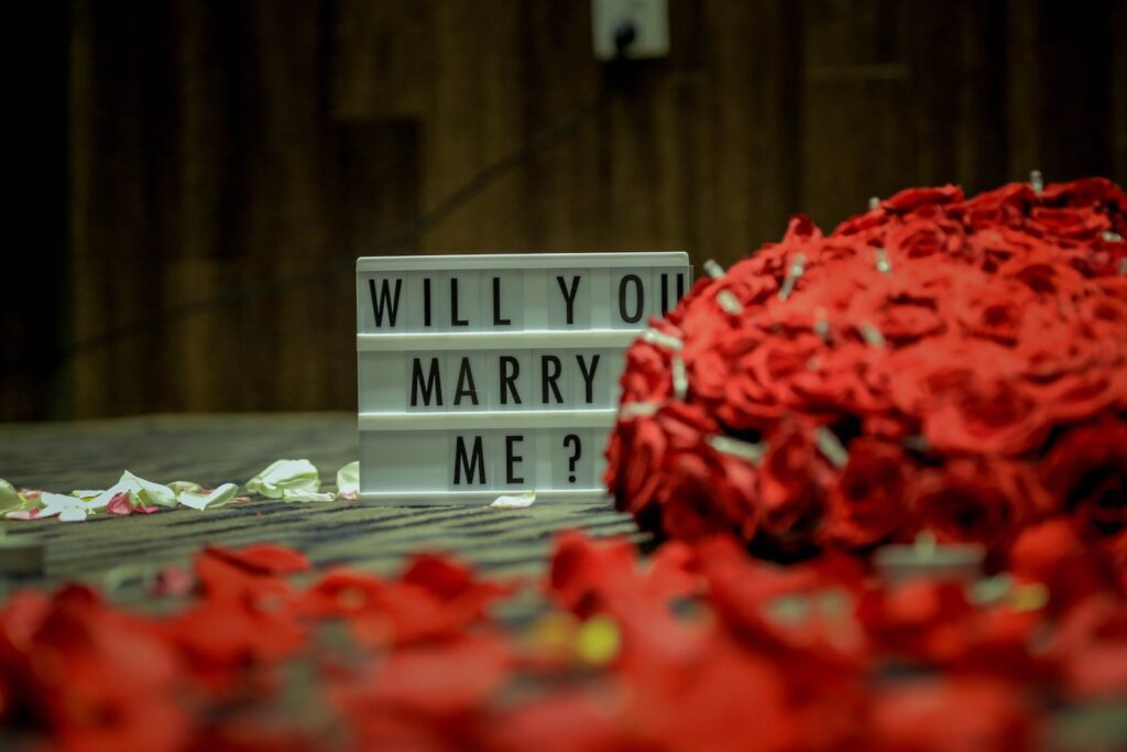 selective focus photography of Will you marry me board on brown surface-Romantic Surprises