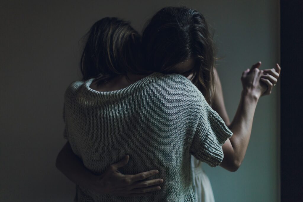 two women hugging each other-Loving and Nurturing Relationship