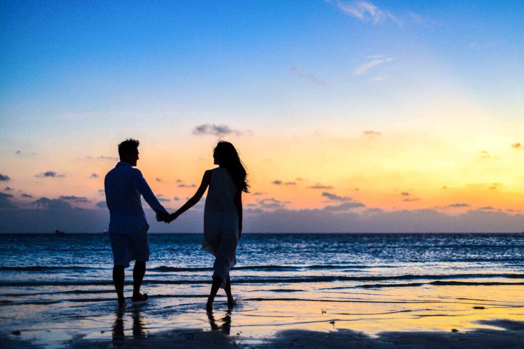 Man and Woman Holding Hands Walking on Seashore during Sunrise
Most Shocking Love Triangles in World History