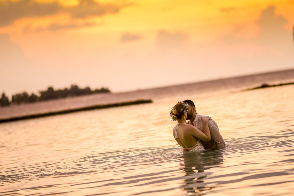 Woman and Man Kissing in Body of Water-Balancing Work and Marriage