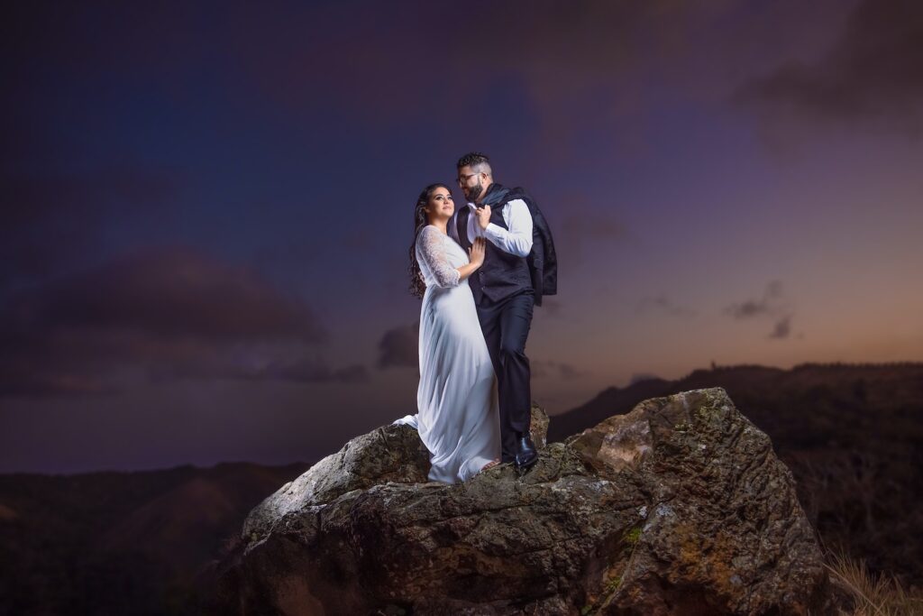 Newlyweds Posing on Top of a Boulder at Night
Most Shocking Love Triangles in World History