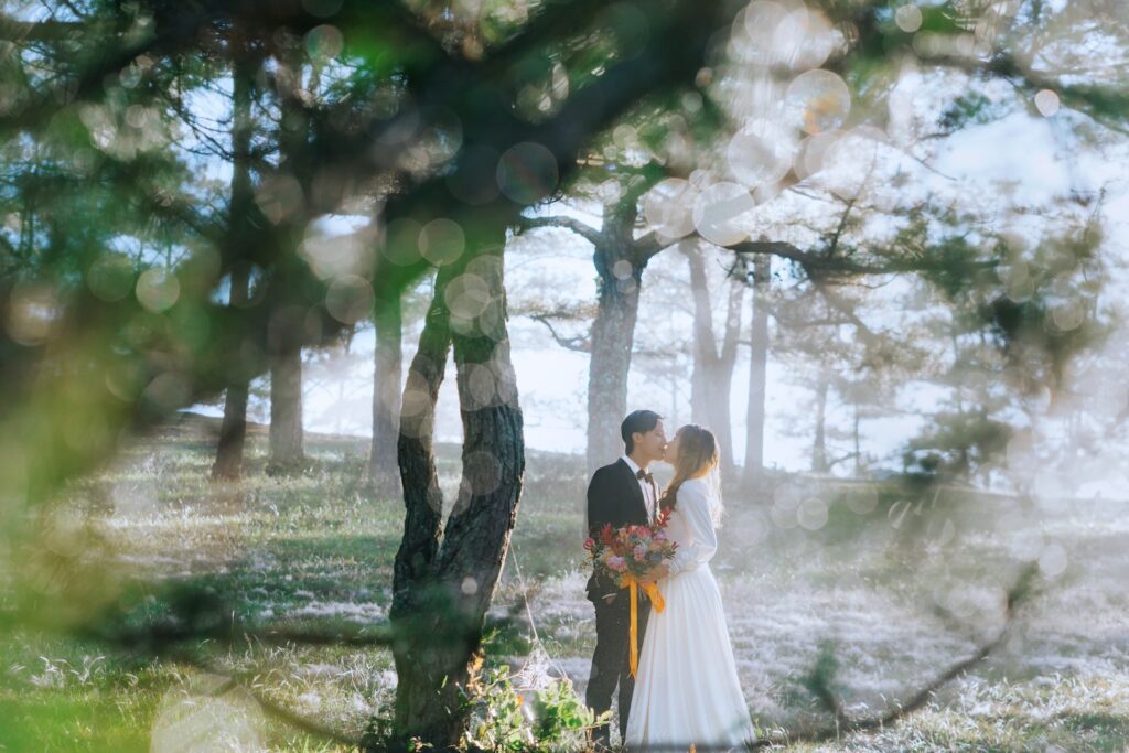 Photo of Bird And Groom Kissing Near Tree-Balancing Work and Marriage