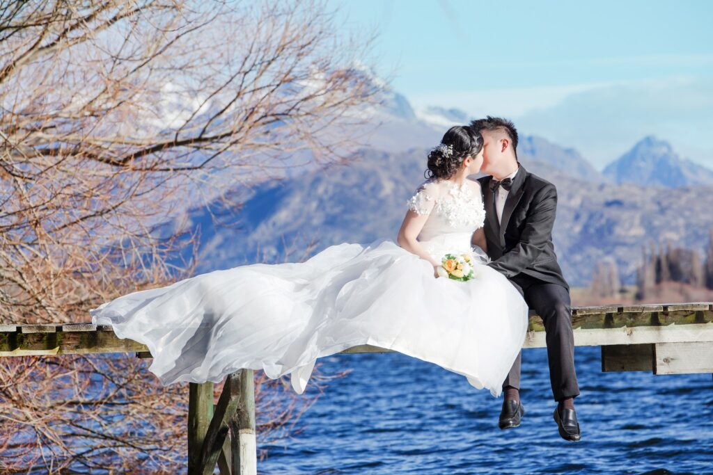 Man and Woman Kissing on Top of Water Dock-Strengthen Your Marriage