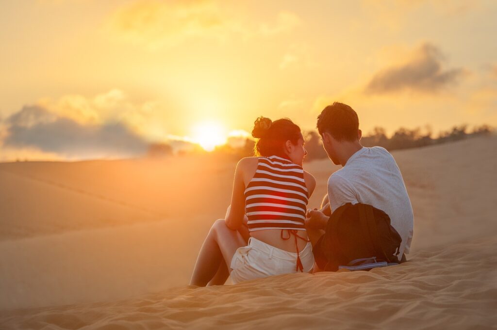 sunset, couple, sand-Communicate Effectively on a First Date