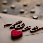 Selective Focus Photo of Love Letter-Questions