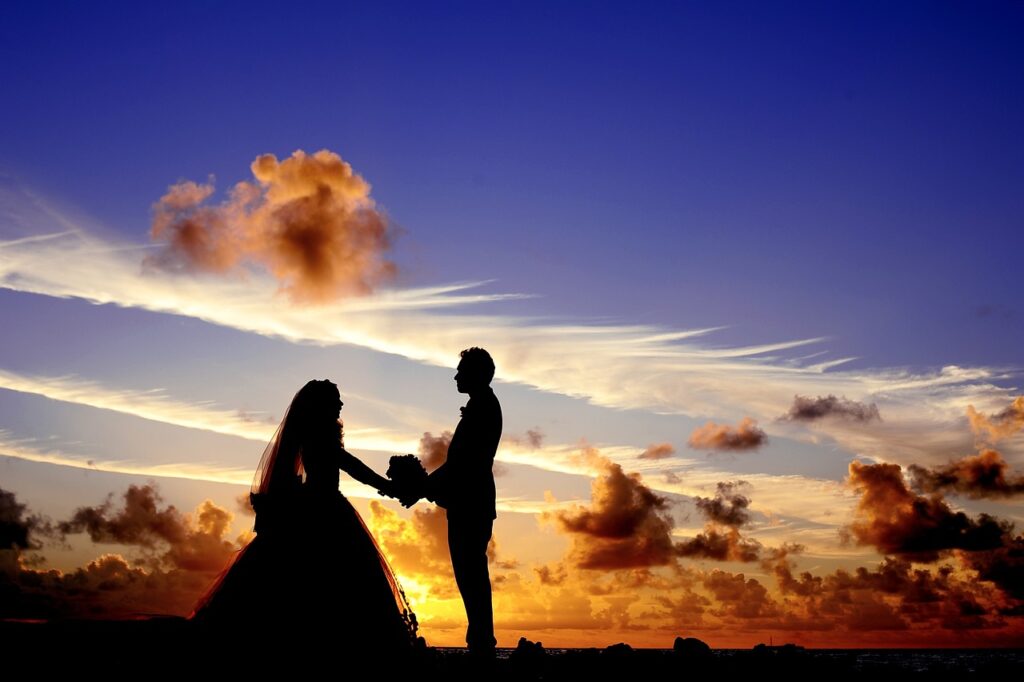 sunset, wedding, silhouettes-Things Women Do to Attract Men