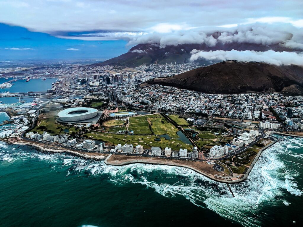 aerial view of city near body of water during daytime Cape Town Best Cities for Single Women to Live