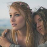two women close up photography-Communicate Effectively on a First Date